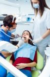 Cute Young Woman At The Dentist. Mouth Checkup Stock Photo