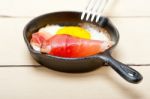 Egg Sunny Side Up With Italian Speck Ham Stock Photo