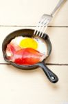 Egg Sunny Side Up With Italian Speck Ham Stock Photo