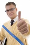 Smiling Student Showing Thumb Up Stock Photo