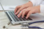 Closeup Of Business Woman Hand Typing On Laptop Keyboard Stock Photo