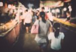 Blurred People In Local Night Market Stock Photo