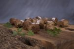 Meatballs On Wooden Cutting Board Stock Photo