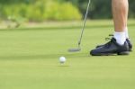 Golf Player Putting On The Green Stock Photo