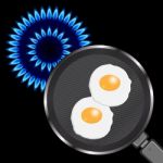 Blue Flame Circle Shape With Frying Pan And Fried Eggs Stock Photo