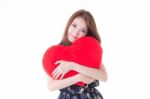 Asian Woman Holding A Red Heart Stock Photo