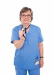 Senior Doctor Holding Stethoscope Stock Photo