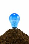 Lightbulb In Soil Stock Photo