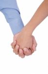 Closeup Of Young Affectionate Couple Holding Hands Over White Ba Stock Photo