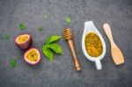 Fresh Passion Fruits Set Up On Dark Stone Background. Passion Fr Stock Photo