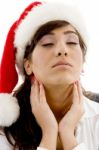 Tired Girl Wearing Christmas Hat Stock Photo