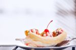 Banana Split Ice Cream With Whipped Cream And Cherry Stock Photo