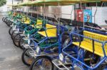 Row Of Four Wheeled Bikes In Santa Barbara Stock Photo