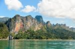 High Mountain Range Above The Green Lake Stock Photo