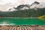 Boardwalk Front Bungalow On Green Lake Stock Photo