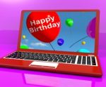 Happy Birthday Balloons On Laptop Stock Photo