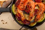 Roasted Shrimps With Zucchini And Tomatoes Stock Photo