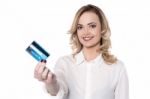 Pretty Woman Holding Her Card Stock Photo