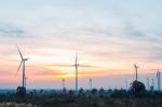 Wind Turbine At Sunrise Stock Photo