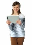 Girl Watching iPad Stock Photo