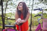 Happy Fatty Woman Posing With Bicycle Stock Photo