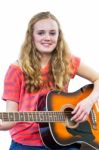 Teenage Girl Playing Guitar Stock Photo