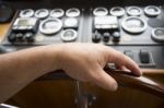 Commander Hands On The Boat Wheel Stock Photo