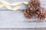 Pine Cones On Wood Background Stock Photo