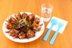 Spicy Herb Fried Chicken Wings On The Table Stock Photo