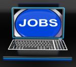 Jobs On Laptop Shows Unemployment Employment Or Hiring Online Stock Photo