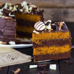 Slice Of Chocolate And Toffee Layer Cake Stock Photo