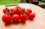 Cherry Tomato Fresh Group On Wooden Chopping Board Stock Photo