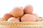 Brown Chicken Eggs In Basket Stock Photo