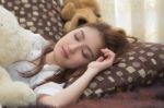 Asian Woman In The Bedroom Stock Photo