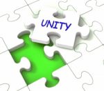 Unity Puzzle Shows Partner Team Teamwork Or Collaboration Stock Photo