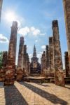 Ancient Pagoda Among The Ruins Pillars Stock Photo