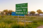 Road Signs On The Border Between Namibia And Botswana Stock Photo