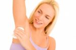 Applying Under Arm Deodorant Stock Photo