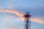 Radar Dome In The Sea With Blue Sky And Clouds Stock Photo