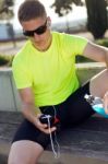 Handsome Young Man Listening To Music After Running Stock Photo