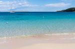 Yacht Off Liscia Ruja Beach Sardinia Stock Photo