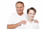 Cheerful Mature Father And Son Posing Stock Photo