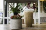 Iced Mocha Coffee On Wooden Table Stock Photo