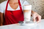 Female Chef Serving Fresh Milkshake Stock Photo