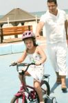 Girl Riding Bicycle Stock Photo