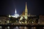 Calvinist And Matthias Churches Illuminated In Budapest Stock Photo