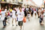 Blurred People Walking On The Street Stock Photo