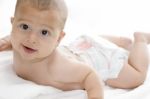 Smiling Baby Lying Stock Photo