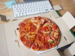 Pizza On Working Table Stock Photo