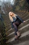 Blonde Caucasian Girl Posing Outdoors Stock Photo